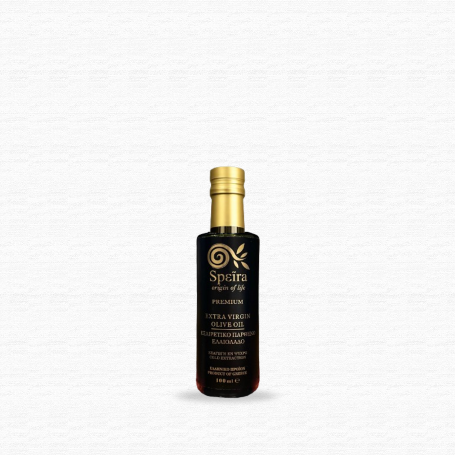 Glass bottle of Greek extra virgin olive oil with black label on white background