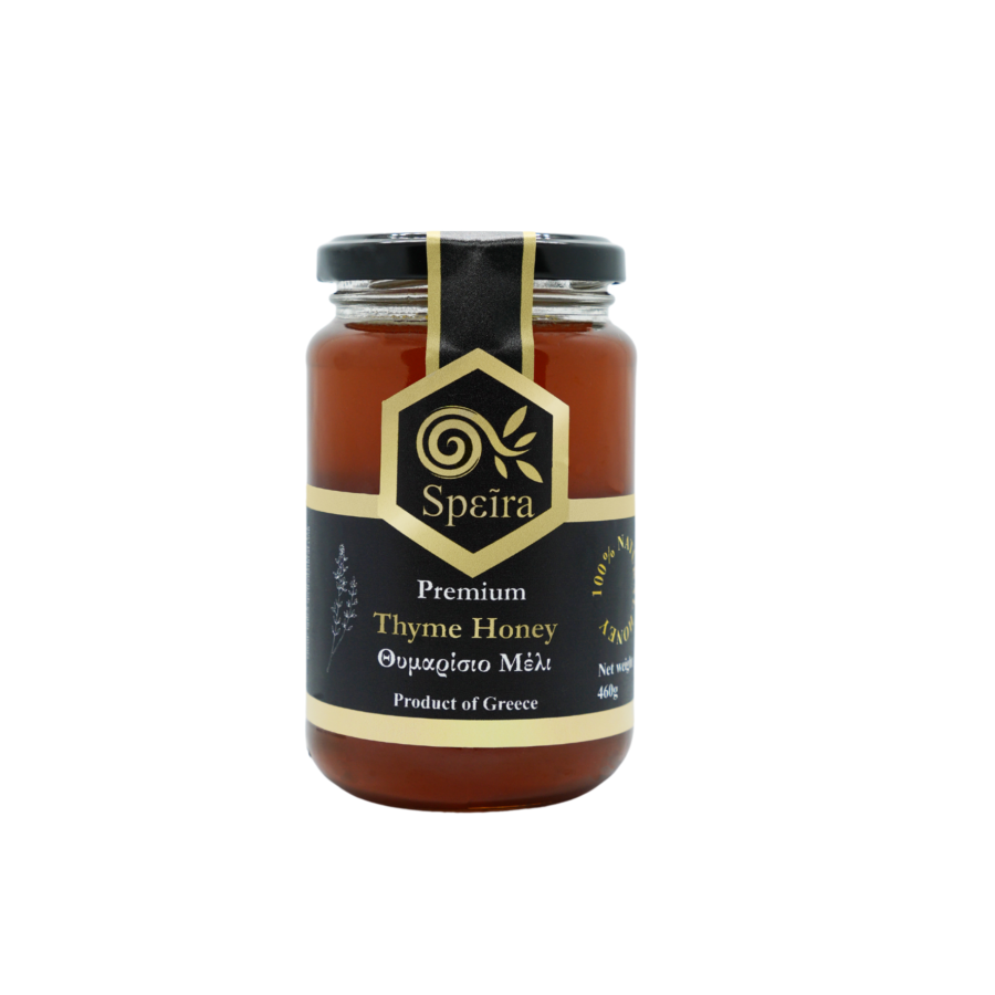 Jar of pure Greek thyme honey with golden hue, harvested from wild thyme flowers in Greece.